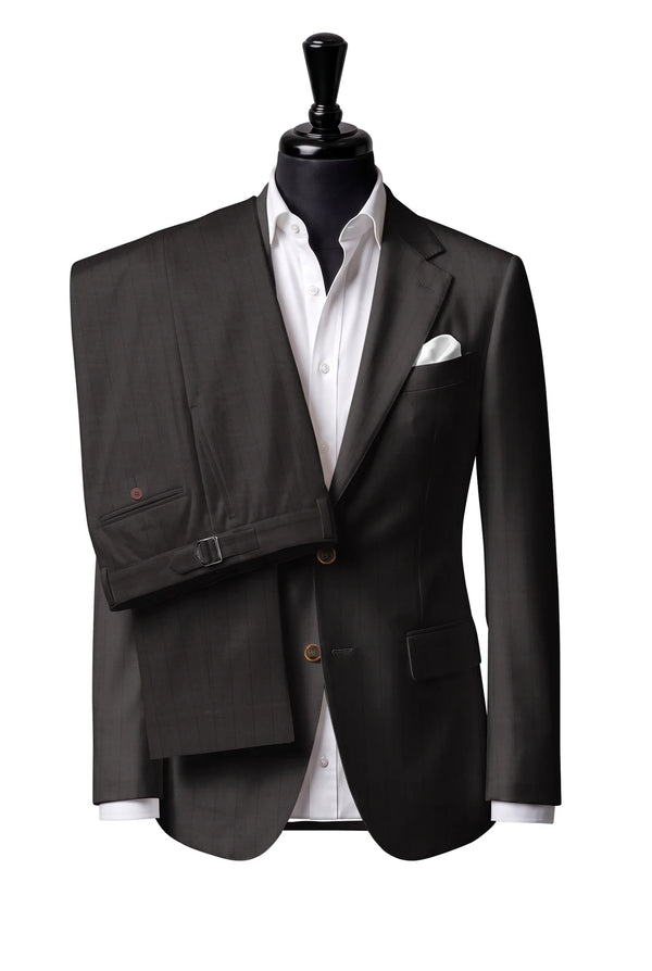 Two-button notch-lapel jacket with straight flap pockets. Trousers with side adjusters.