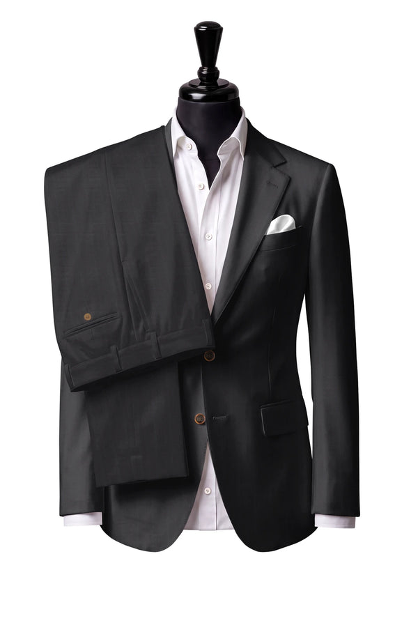 Two-button notch-lapel jacket with straight flap pockets. Trousers with belt loops.