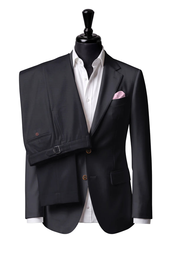 Two-button notch-lapel jacket with straight flap pockets. Trousers with side adjusters.