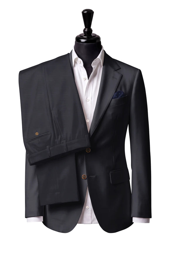 Two-button notch-lapel jacket with straight flap pockets. Trousers with belt loops.