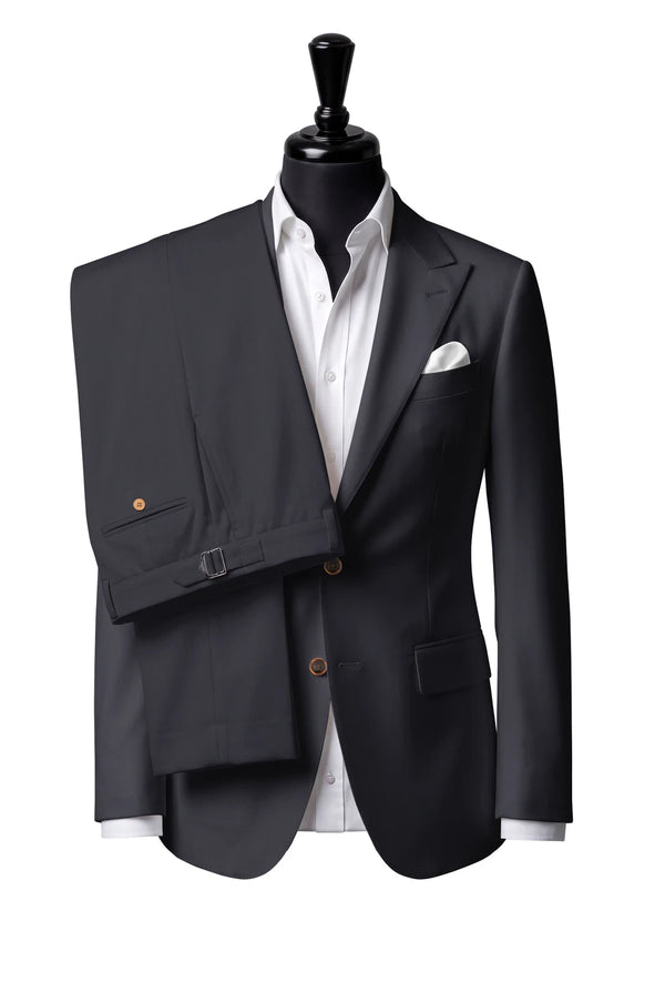 Two-button peak-lapel jacket with straight flap pockets. Trousers with side adjusters.
