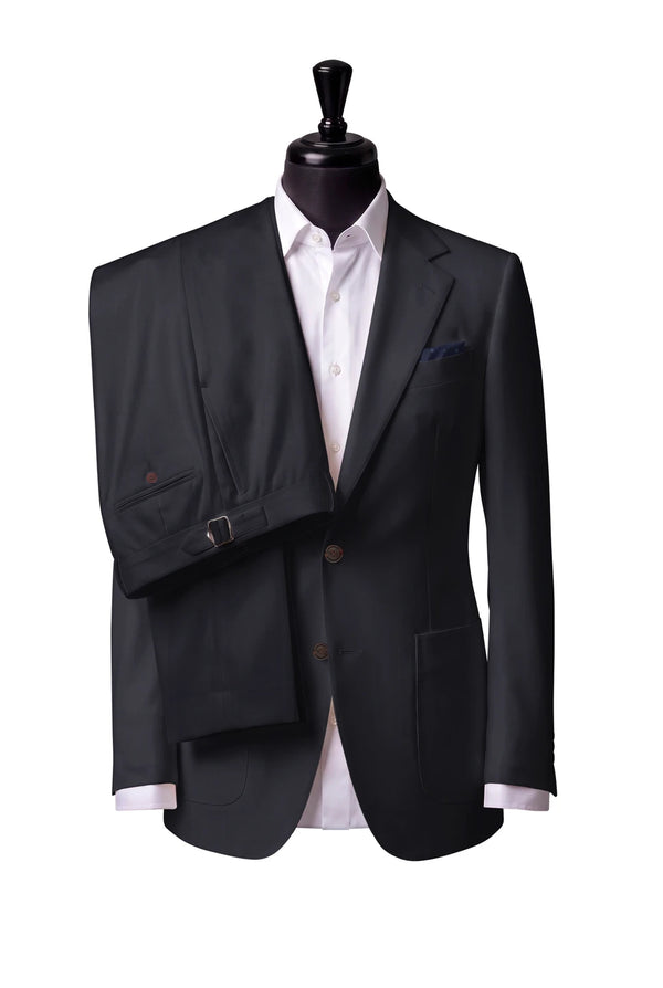 Two-button notch-lapel jacket with patch pockets. Trousers with side adjusters.