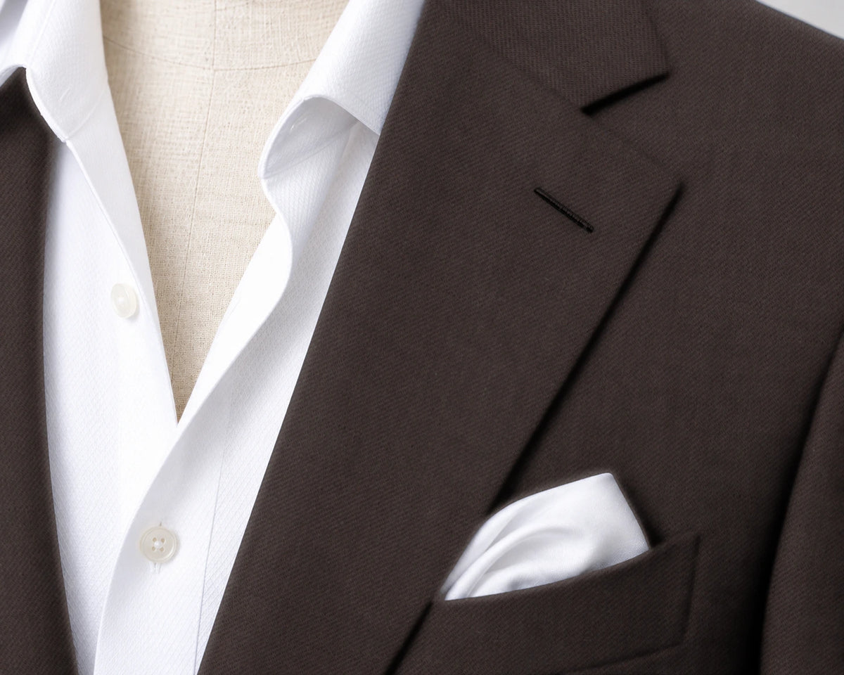 Brown Foundation Suit — fabric detail