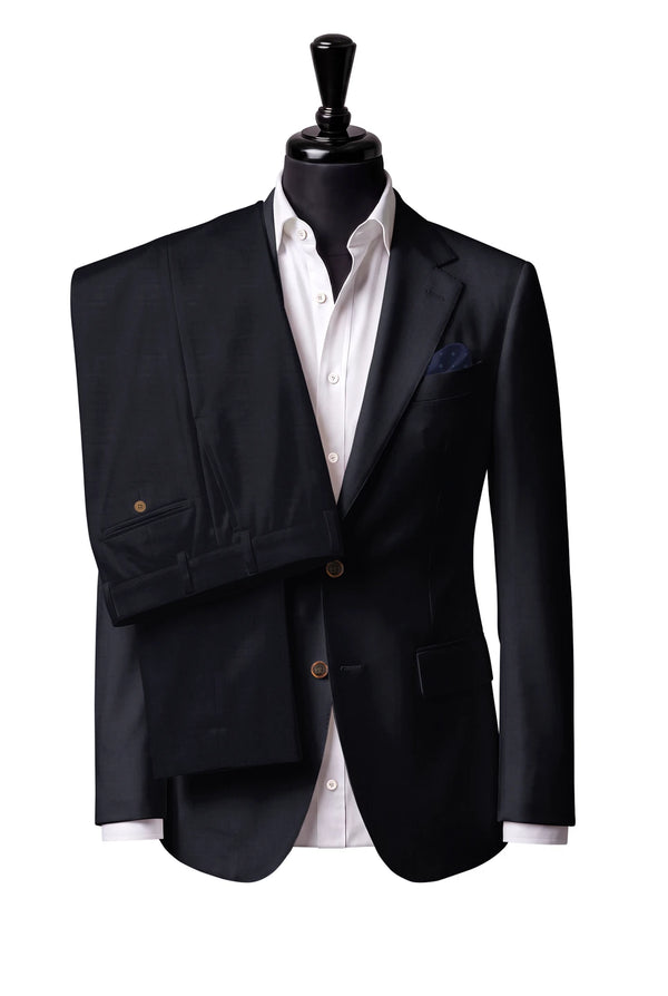 Two-button notch-lapel jacket with straight flap pockets. Trousers with belt loops.