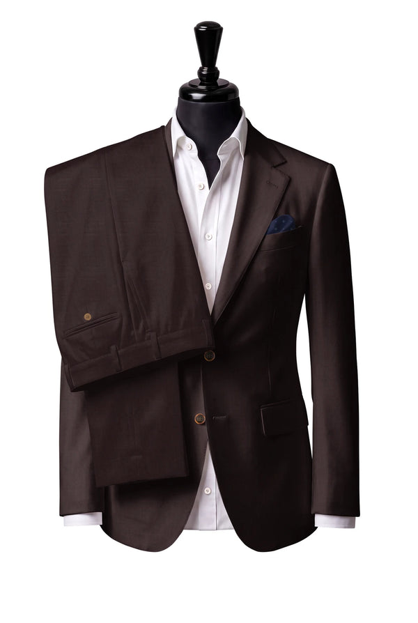 Two-button notch-lapel jacket with straight flap pockets. Trousers with belt loops.
