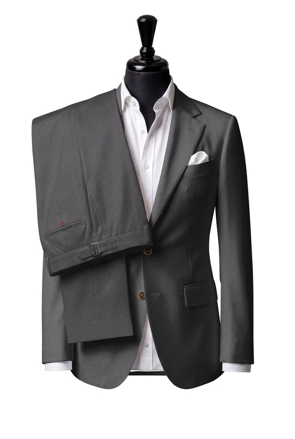 Two-button notch-lapel jacket with straight flap pockets. Trousers with side adjusters.