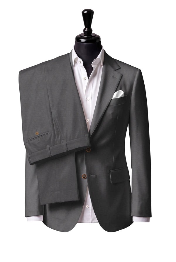 Two-button notch-lapel jacket with straight flap pockets. Trousers with belt loops.
