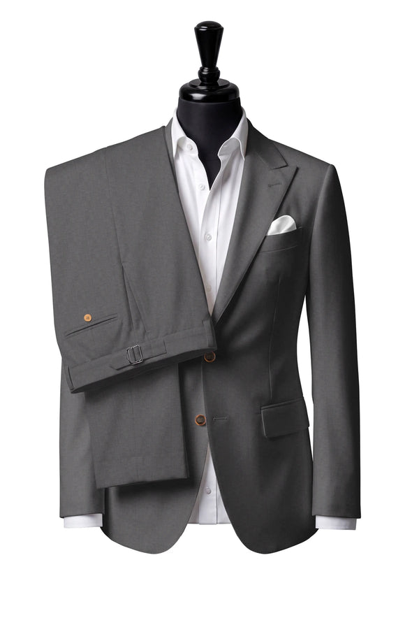 Two-button peak-lapel jacket with straight flap pockets. Trousers with side adjusters.