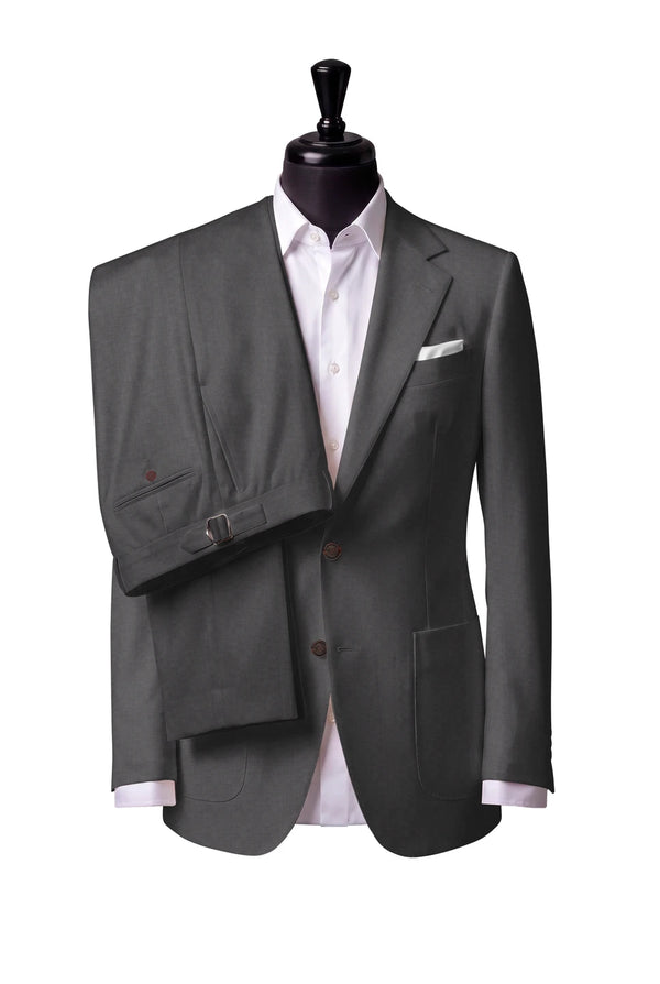 Two-button notch-lapel jacket with patch pockets. Trousers with side adjusters.