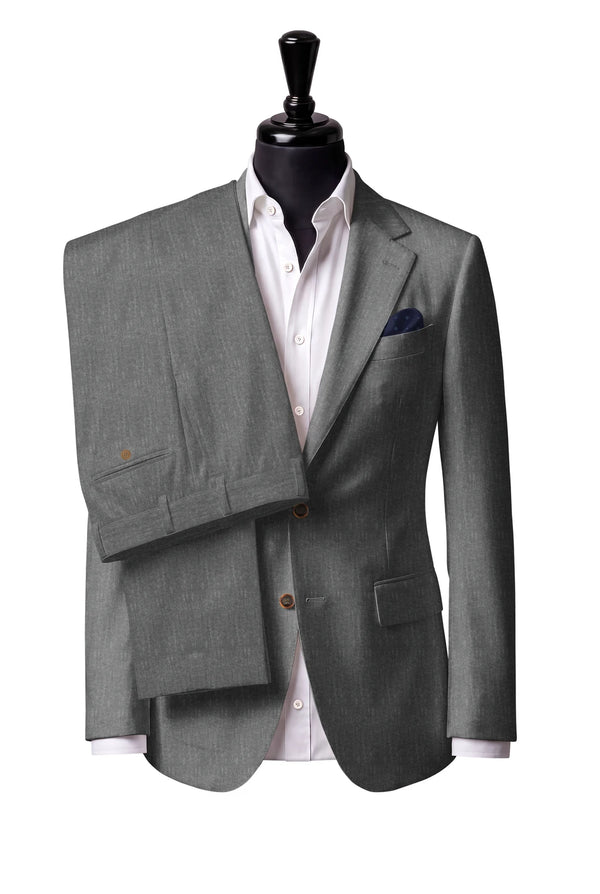 Two-button notch-lapel jacket with straight flap pockets. Trousers with belt loops.