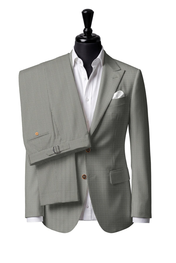 Two-button peak-lapel jacket with straight flap pockets. Trousers with side adjusters.