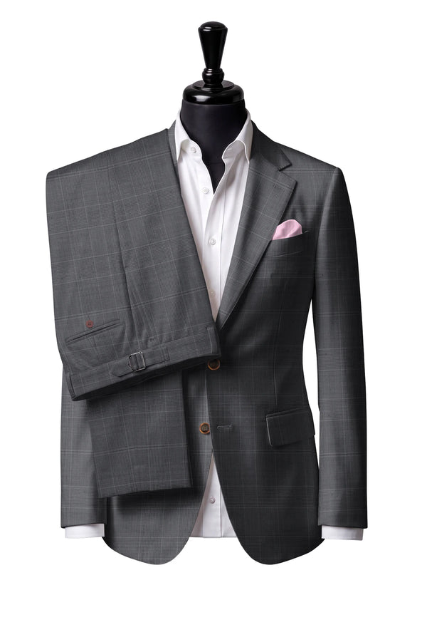 Two-button notch-lapel jacket with straight flap pockets. Trousers with side adjusters.