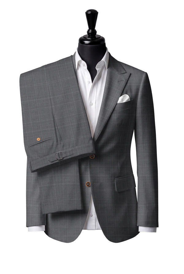 Two-button peak-lapel jacket with straight flap pockets. Trousers with side adjusters.