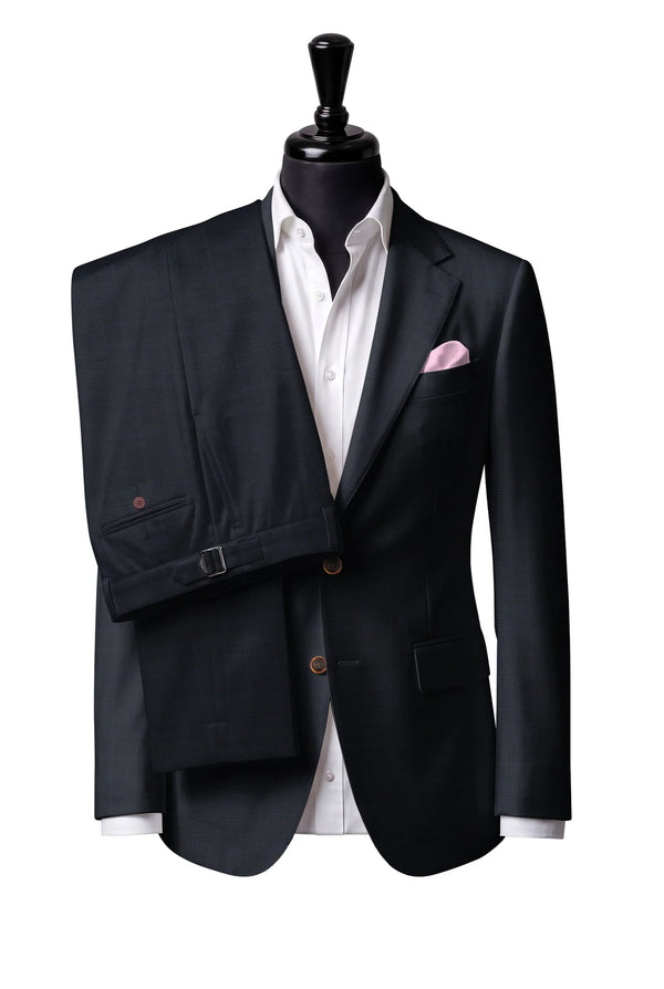 Two-button notch-lapel jacket with straight flap pockets. Trousers with side adjusters.