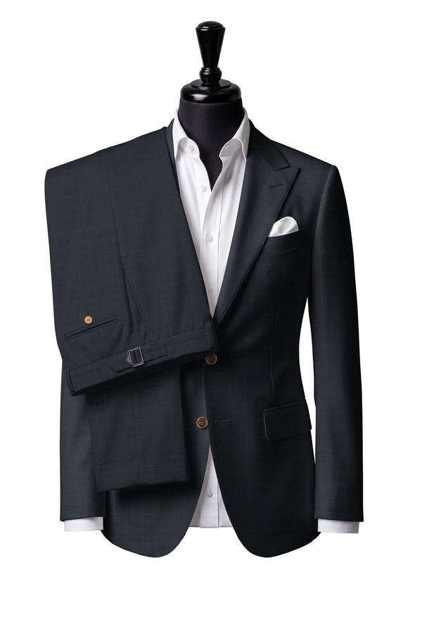 Two-button peak-lapel jacket with straight flap pockets. Trousers with side adjusters.