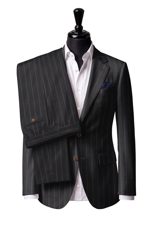 Two-button notch-lapel jacket with straight flap pockets. Trousers with belt loops.