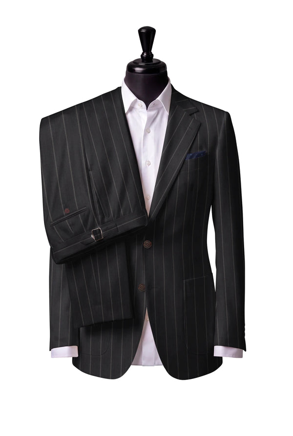 Two-button notch-lapel jacket with patch pockets. Trousers with side adjusters.